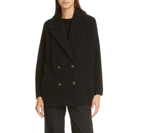 model in the black coat with four buttons