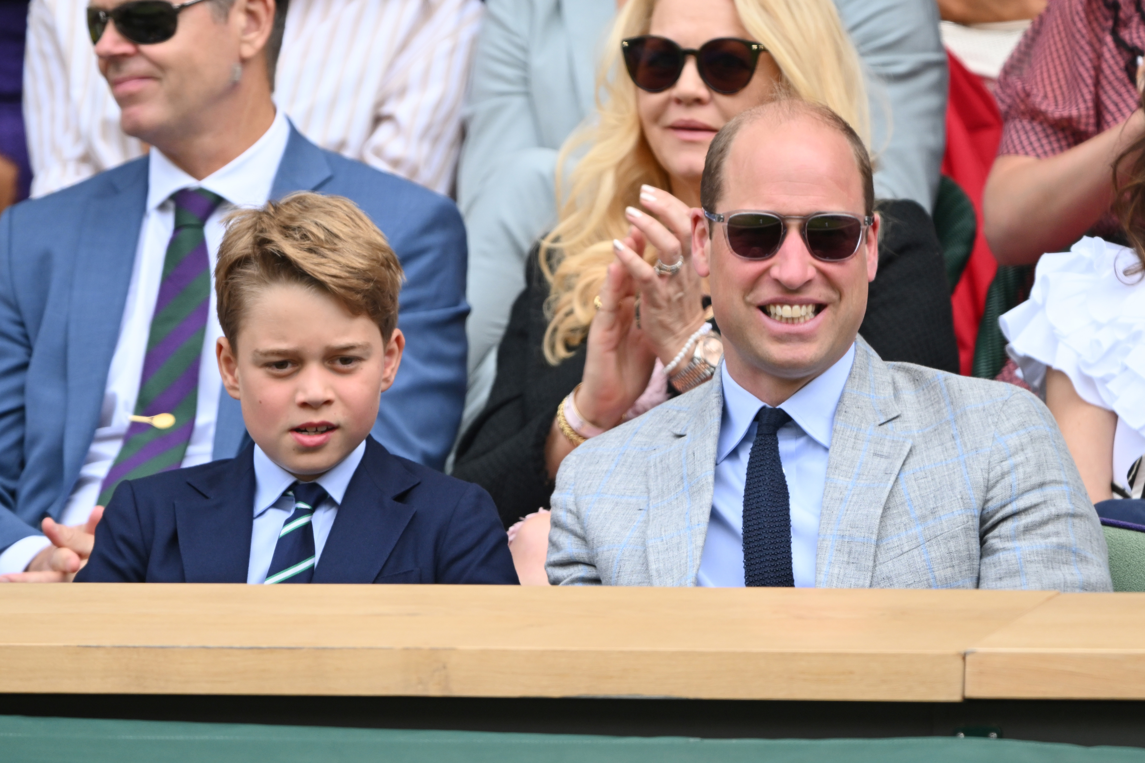 George next to William, wearing sunglasses