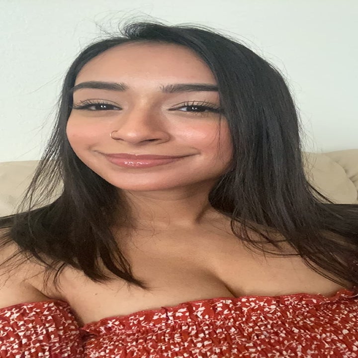 another reviewer wearing the stone gloss