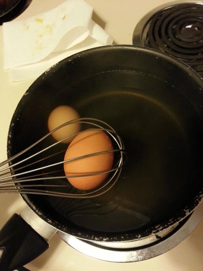 A whisk on an egg