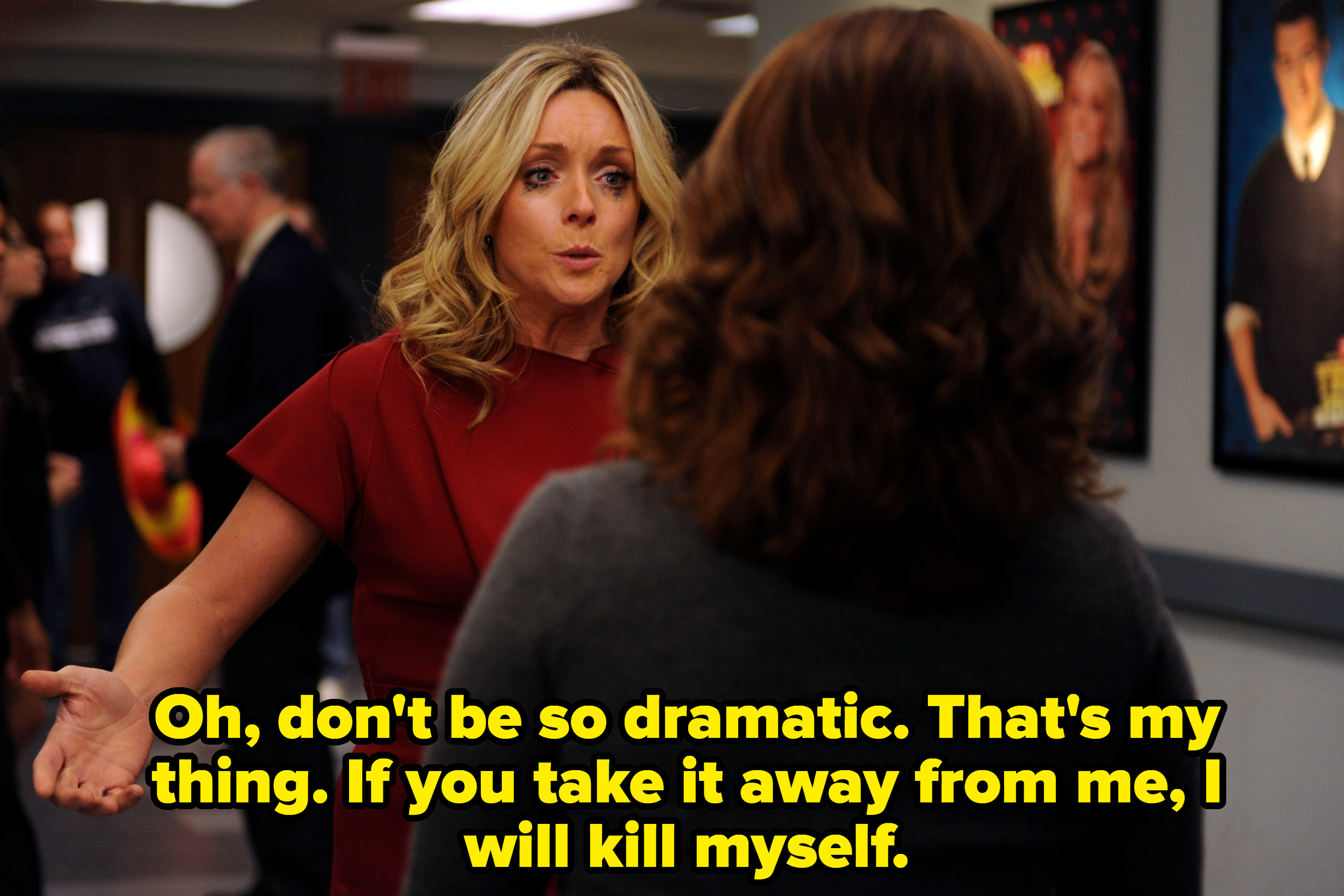 Jane Krakowski talks to someone