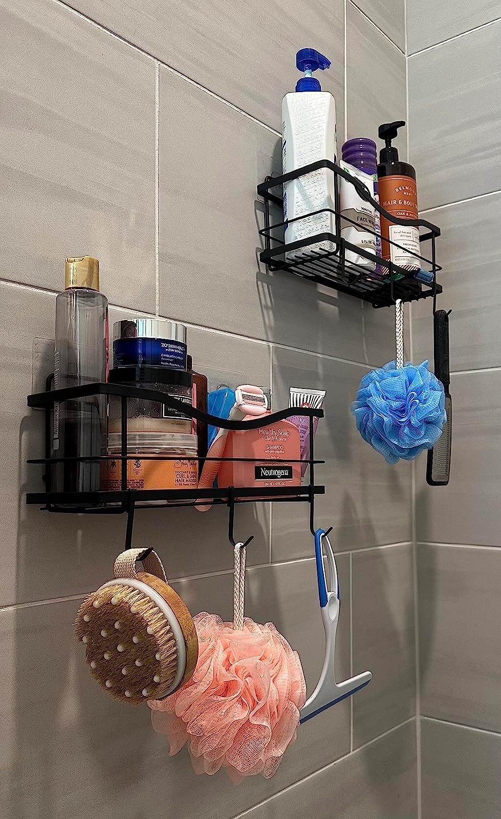 reviewer&#x27;s shower with a caddy on the wall holding all their things