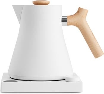A white tea kettle.