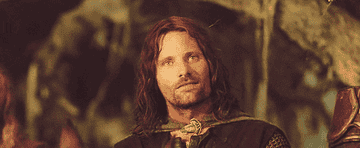 Viggo Mortensen&#x27;s character Aragorn smiling and nodding