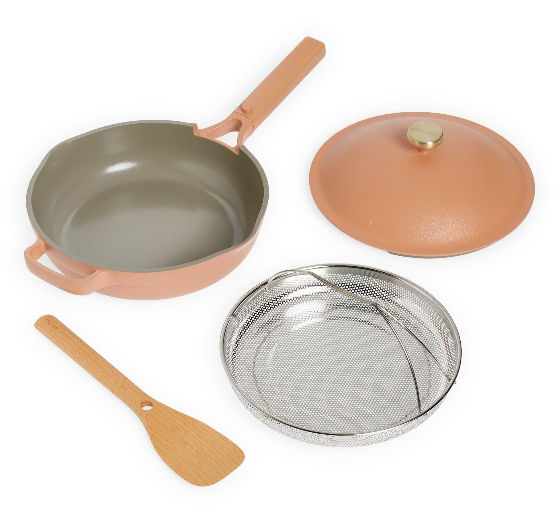 Peach pan with spatula, lid, and steamer basket.