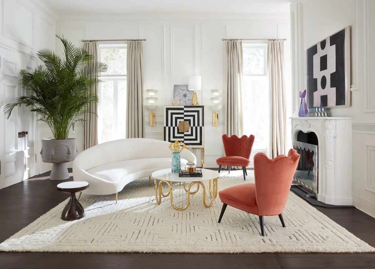 curved sofa in a colorful room