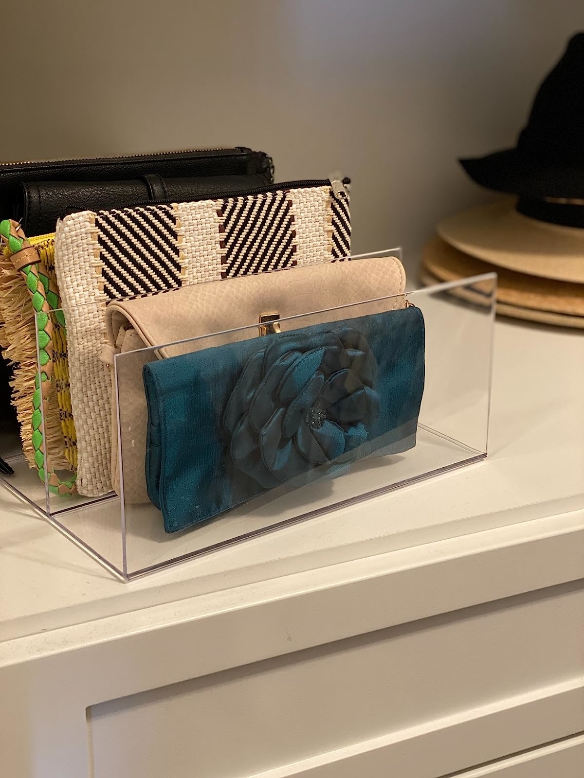 Reviewer image of clutch bags in the clear organizer