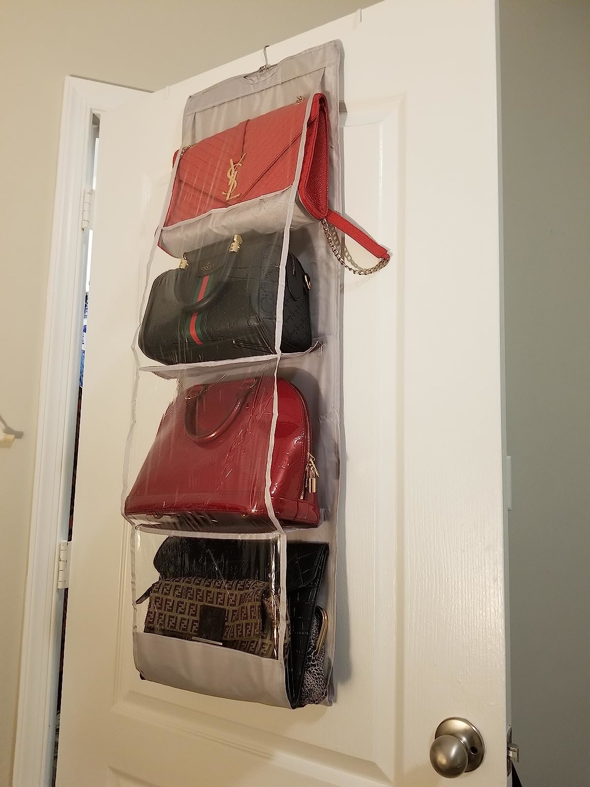 Reviewer image of bags inside the organizer hanging on a door