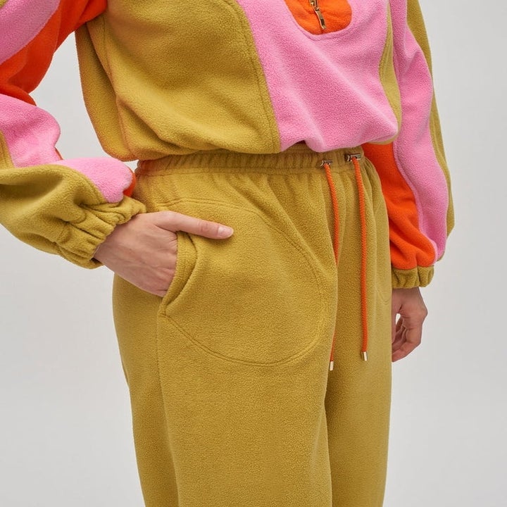 closeup of the sweatpants pockets and the pants fuzzy texture