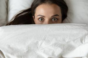 a sleeper underneath a weighted blanket; weighted blankets on tiktok