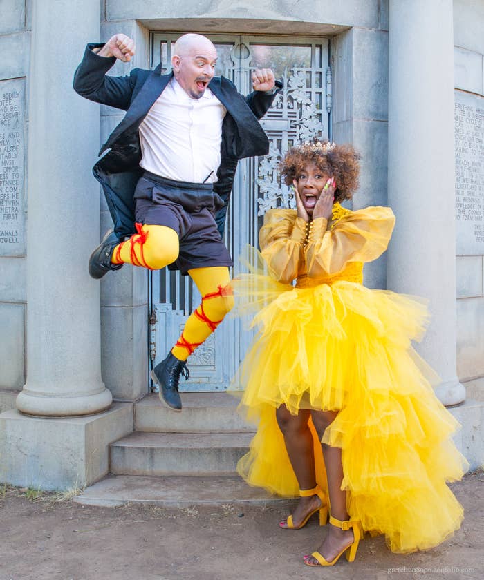 Malvolio in yellow stockings, crossgartered in red with black pants and suit jacket. Malvolio is leaping in the air. Olivia in a bright yellow party gown with a surprised look on her face.