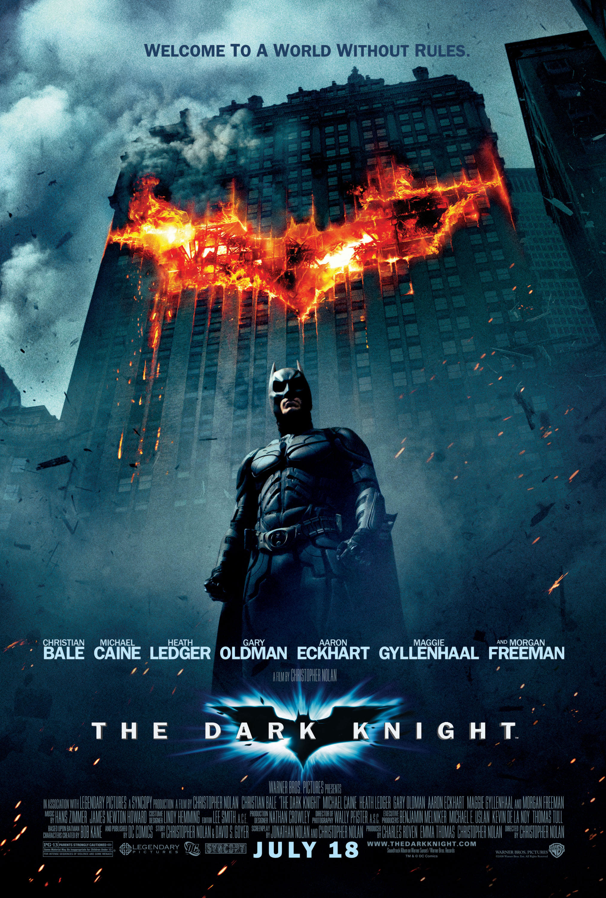 Batman stands in the center of the city on The Dark Knight movie poster.
