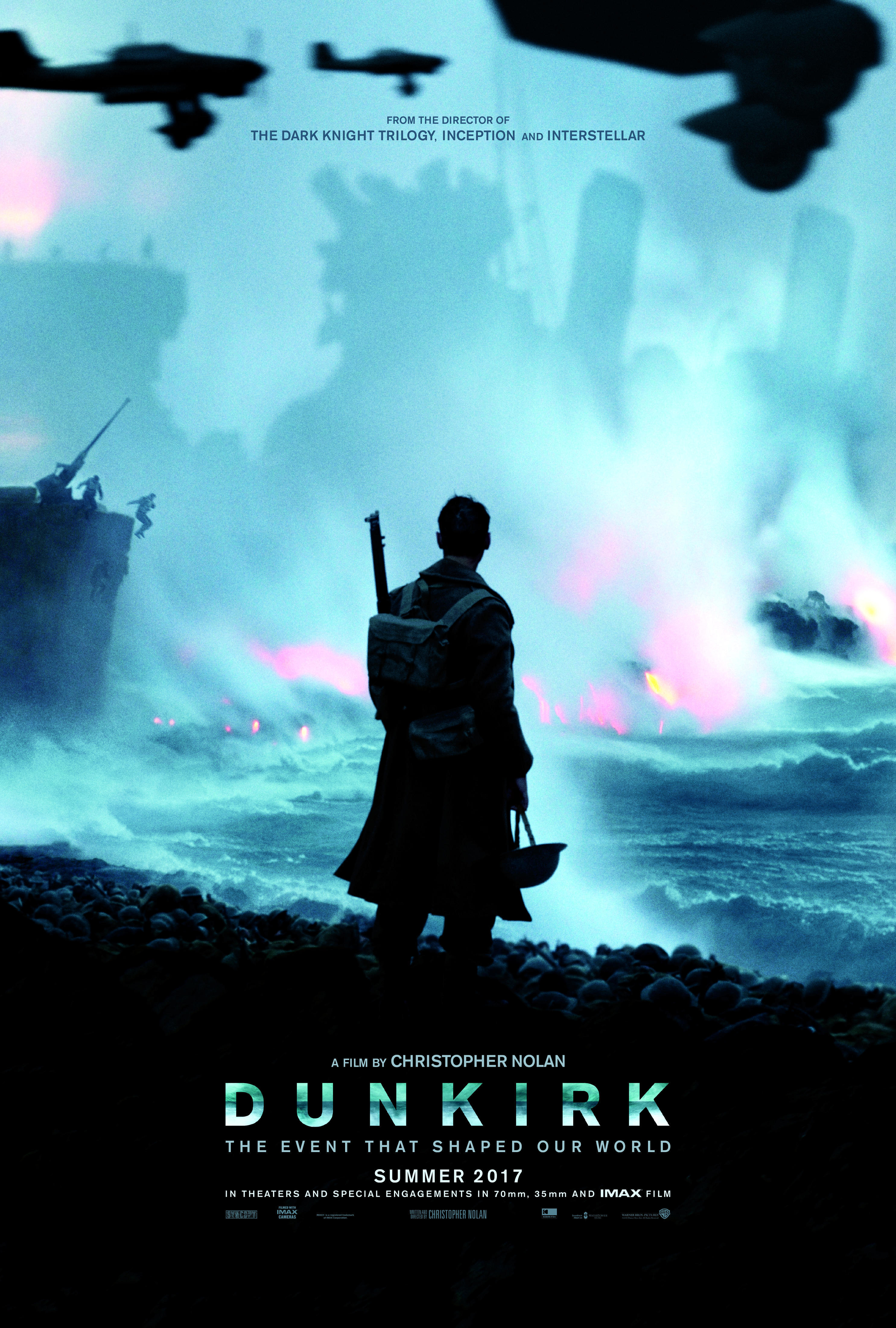 A lone soldier stands in the center of the beach on the Dunkirk movie poster.