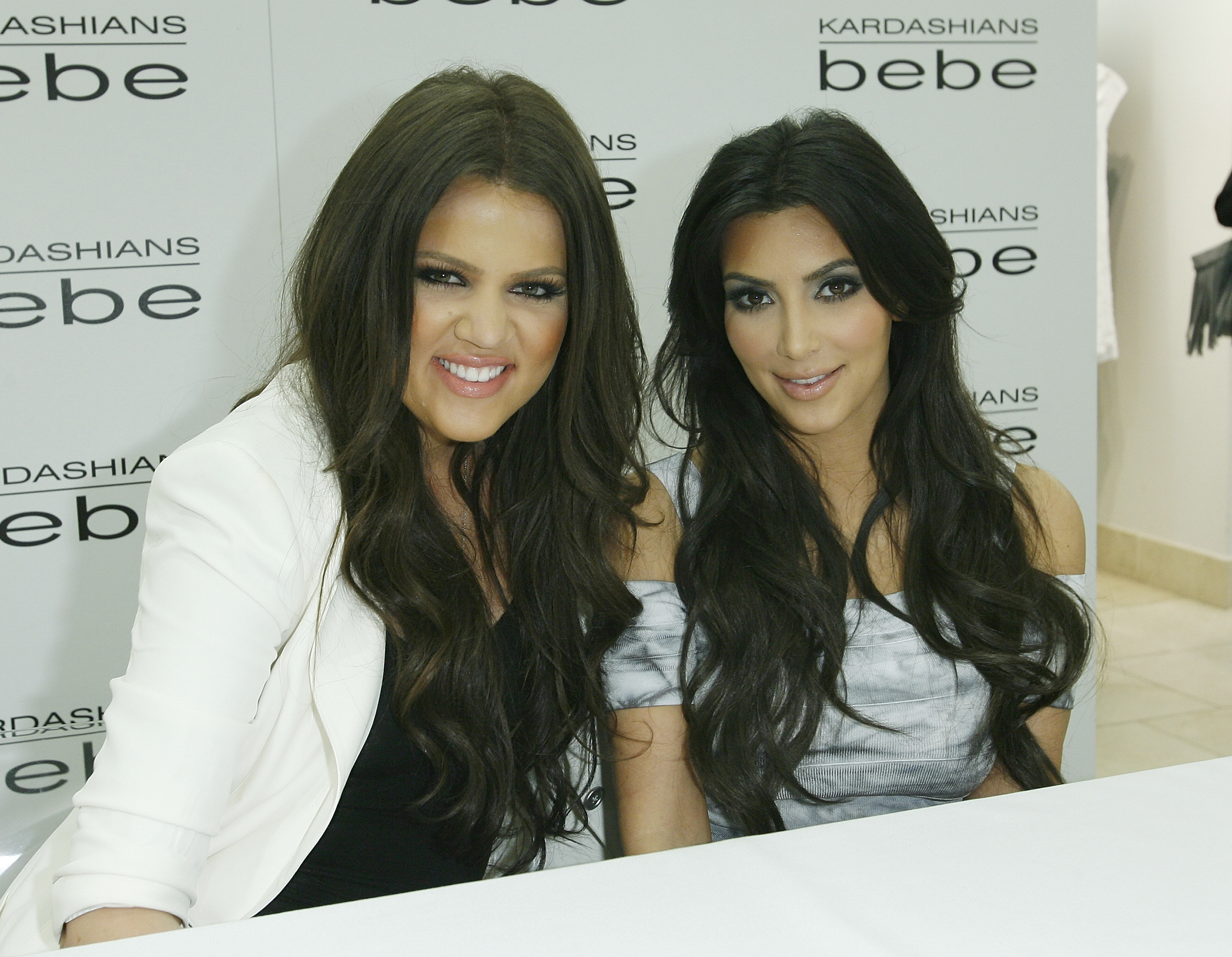 Khloé and Kim at a media event