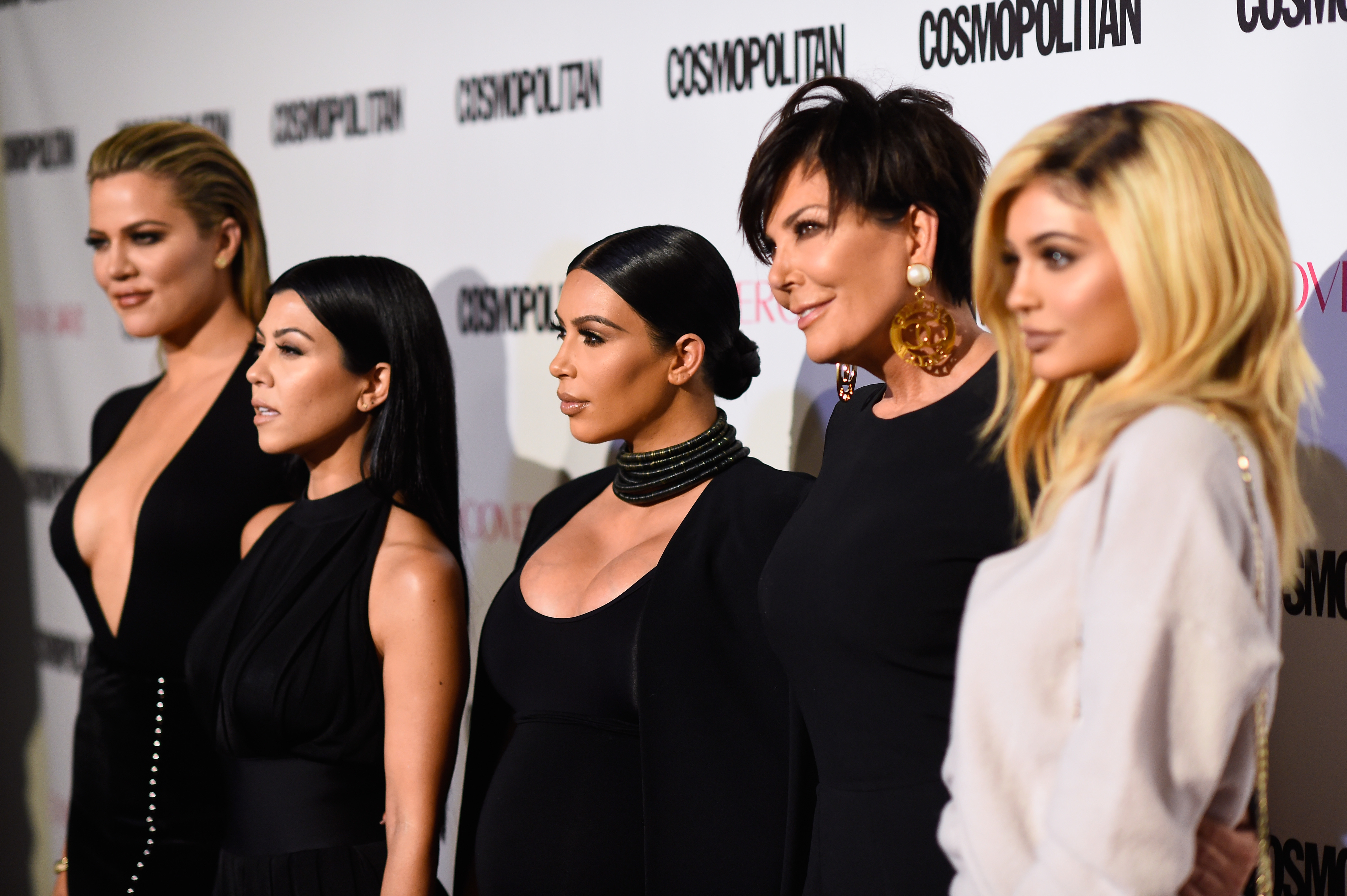 Kris and Kylie Jenner and Kourtney, Khloé, and Kim Kardashian at a media event