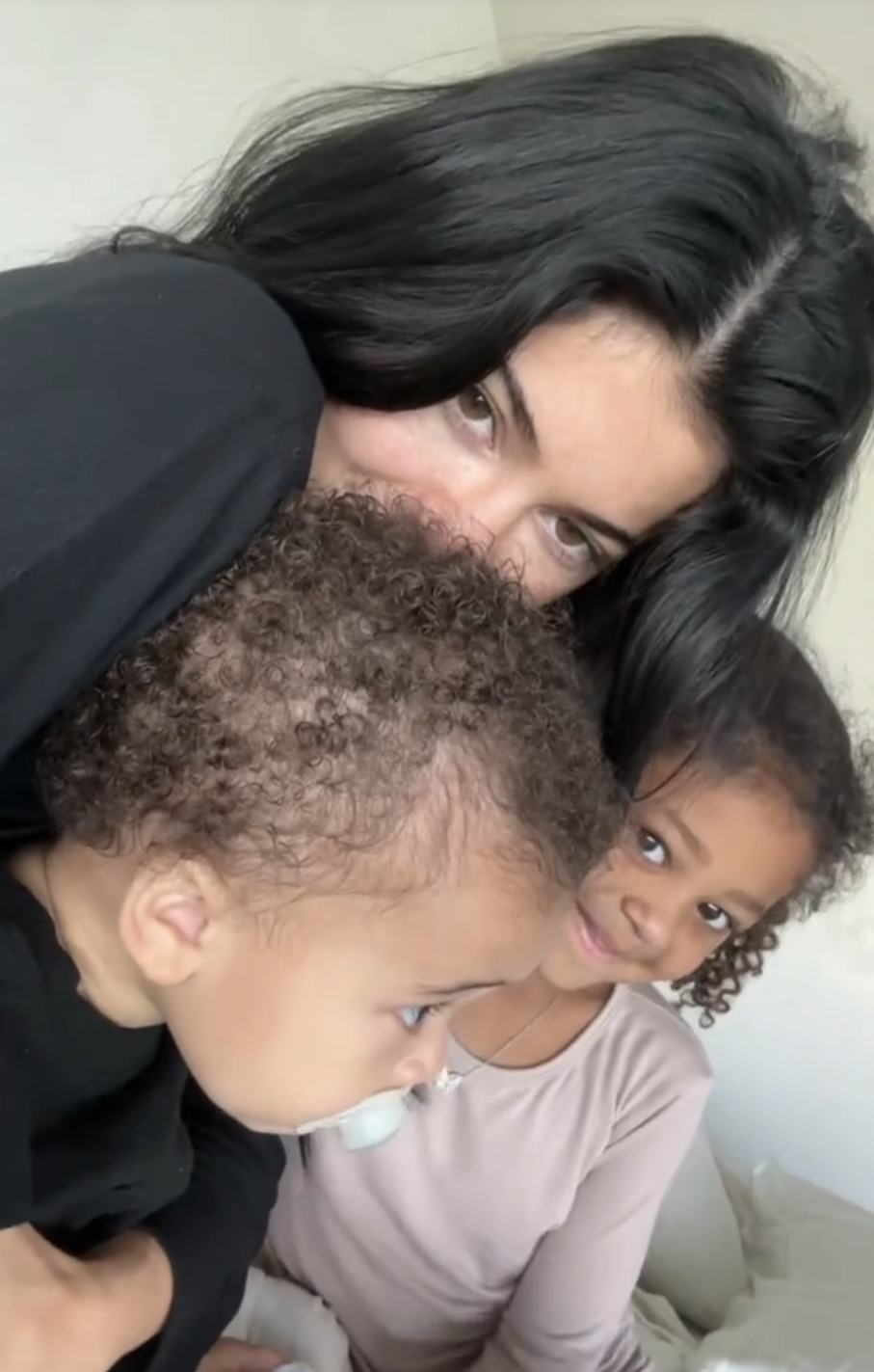 Close-up of Kylie with Stormi and Aire