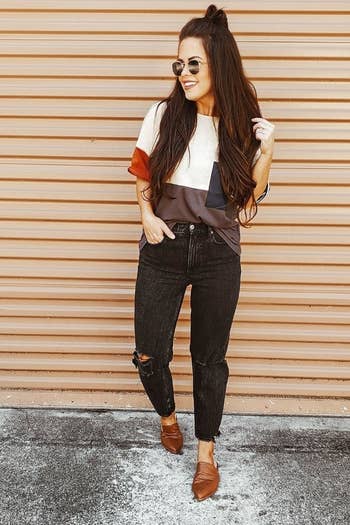 Reviewer wearing the mules in brown