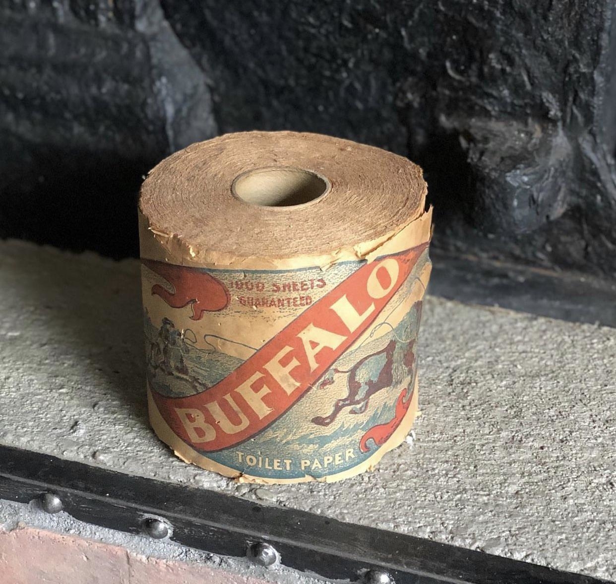 A very frayed, brownish roll of 1,000 sheets of &quot;Buffalo&quot; toilet paper