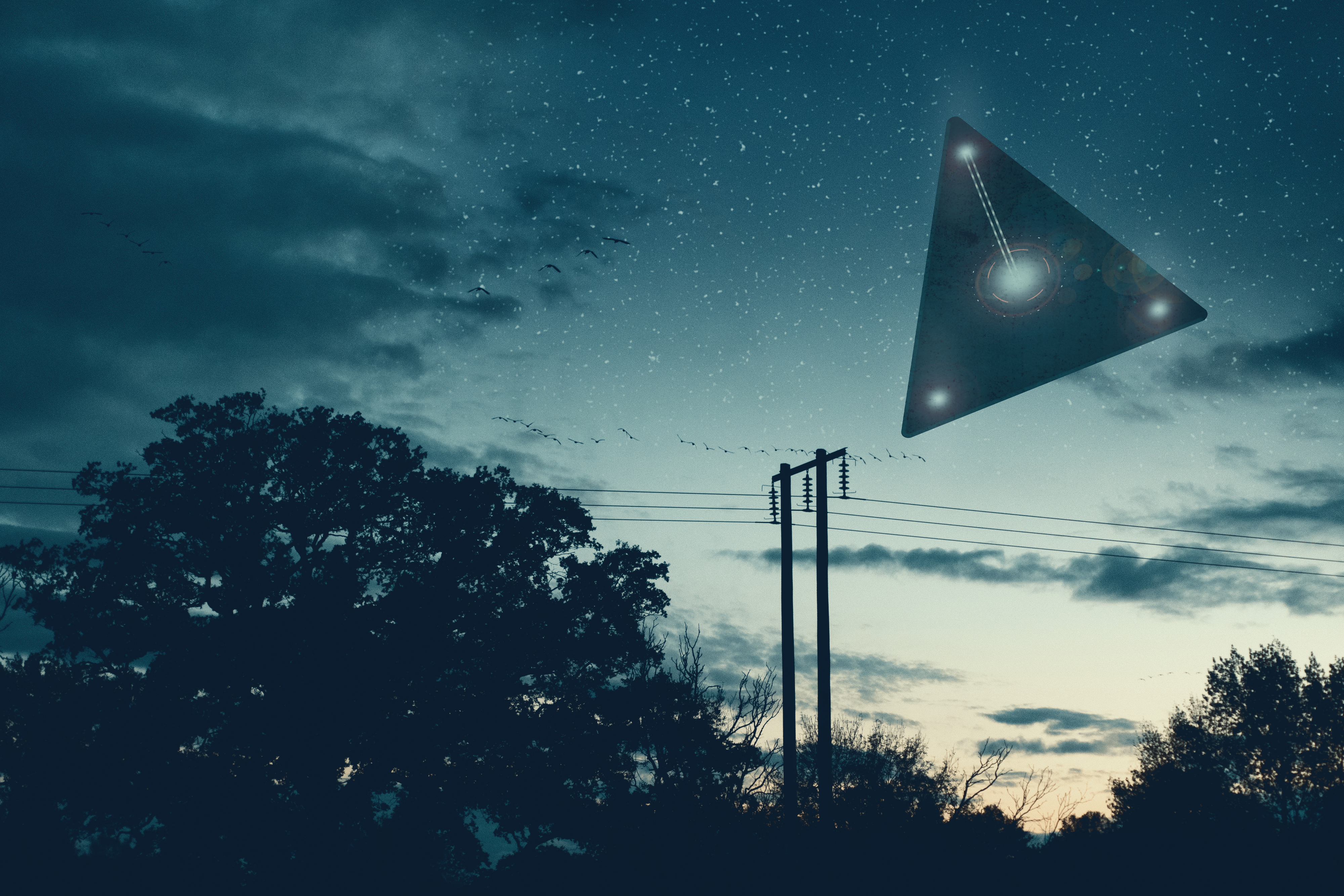 A triangular UFO in the night sky