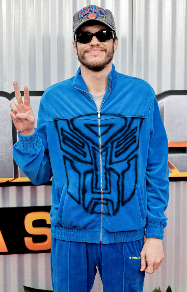 Pete Davidson giving the peace sign