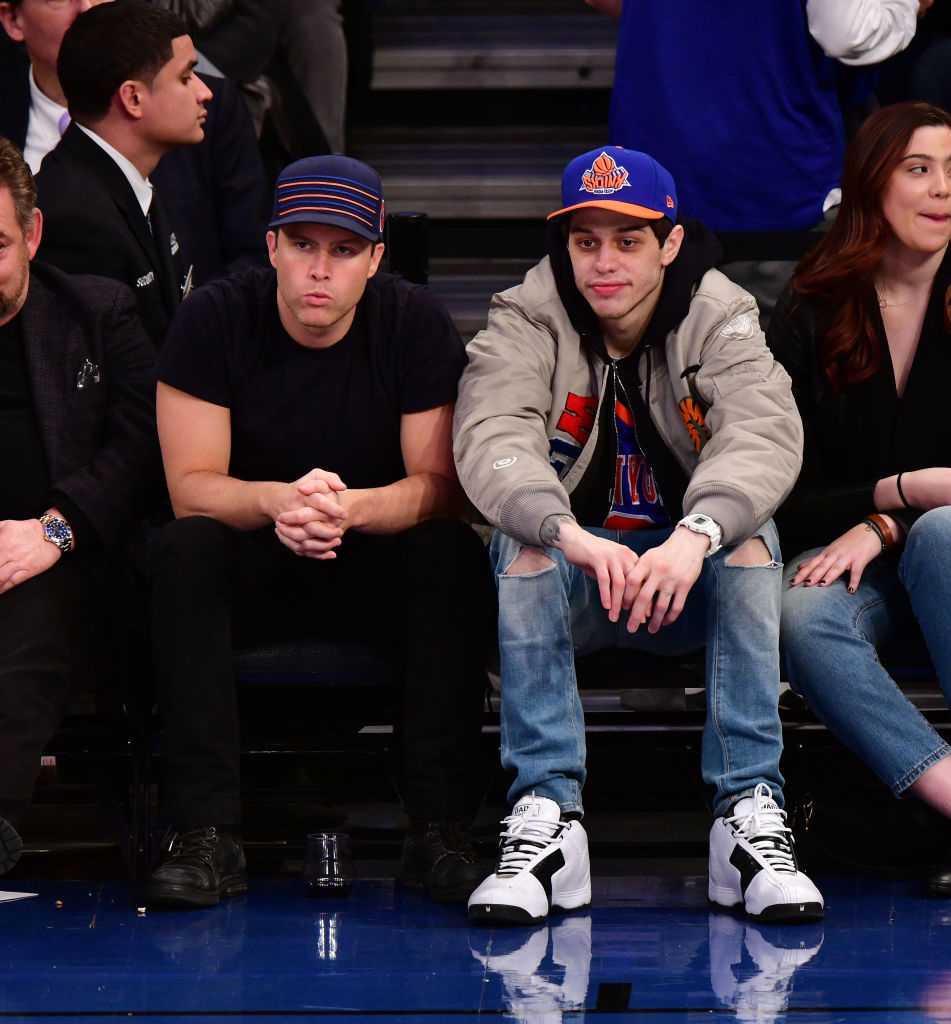 Colin Jost and Pete Davidson at a basketball game
