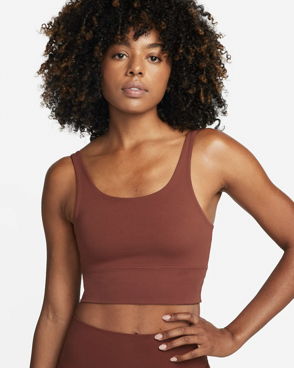 A model wearing the tank top in brown