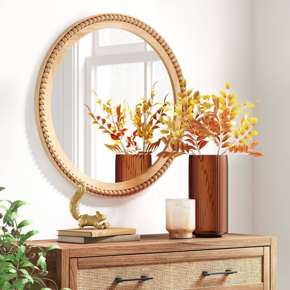 Round wooden beaded wall mirror