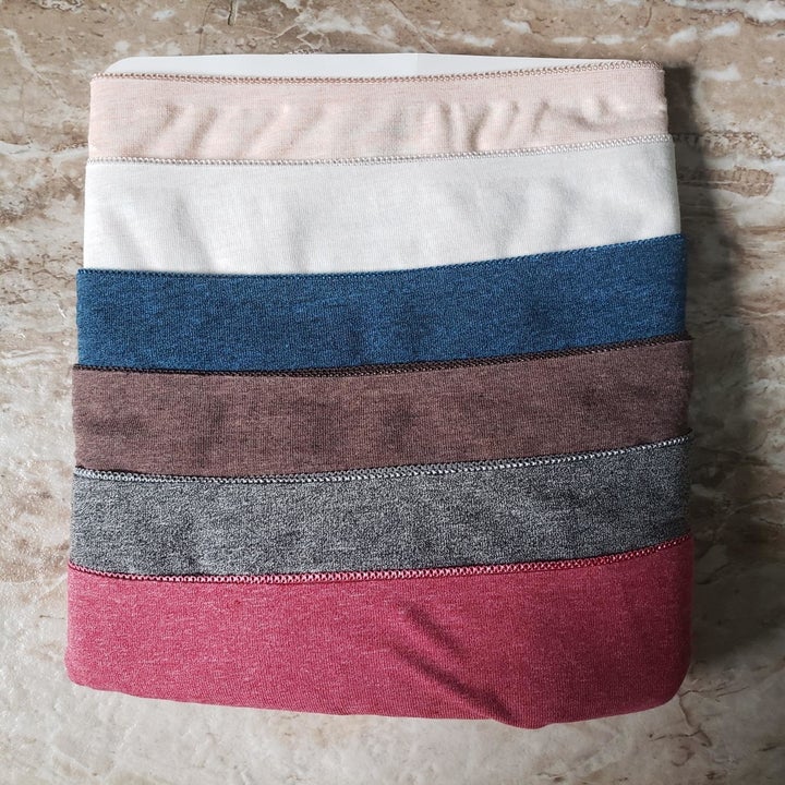 Reviewer image of folded pairs of underwear