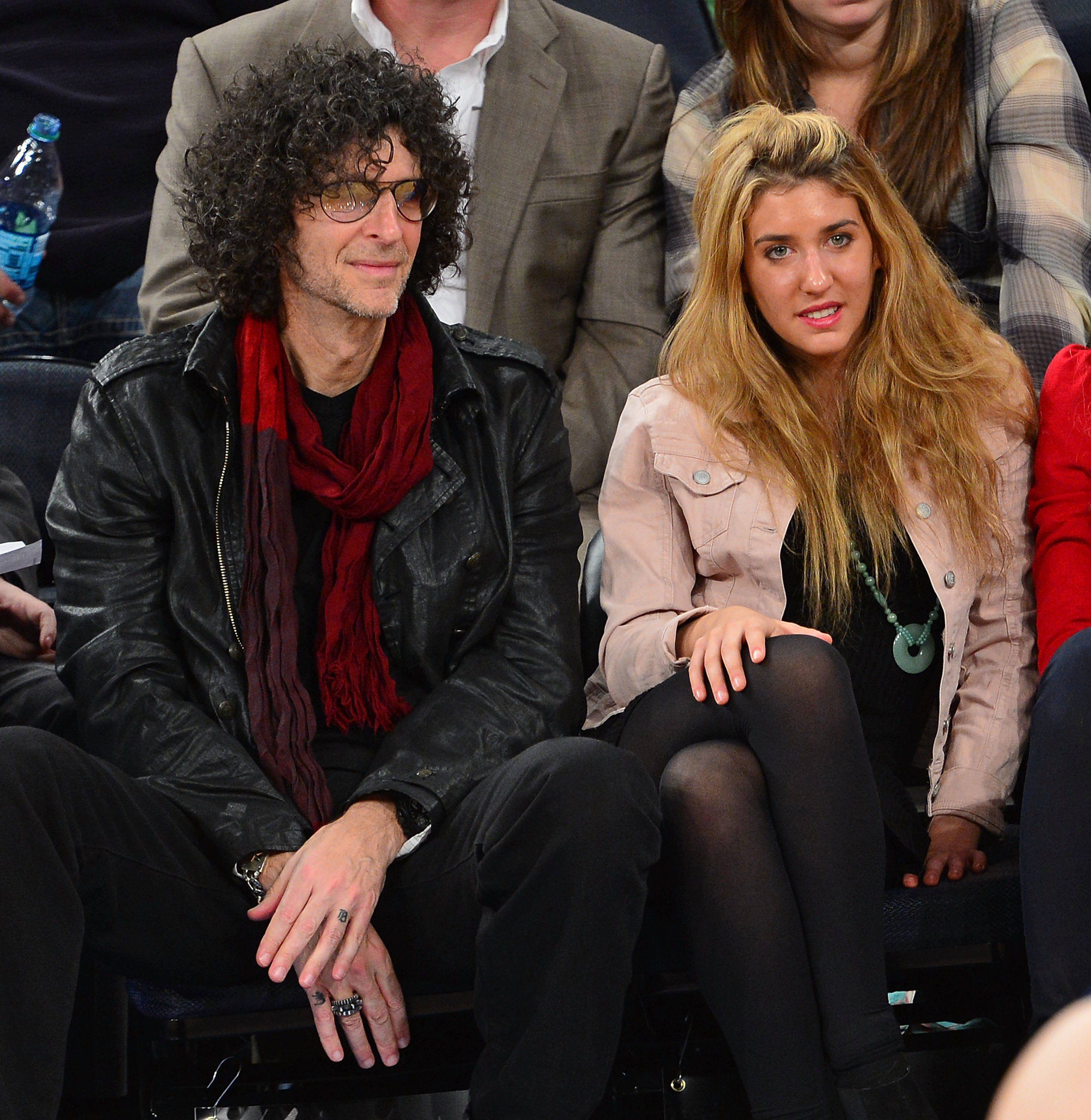 the two sitting courtside at a game