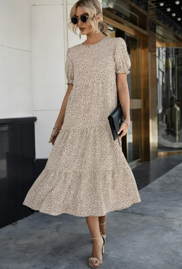 A midi dress with puff sleeves