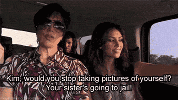 Kim Kardashian taking selfies while dropping Khloé Kardashian off for jail