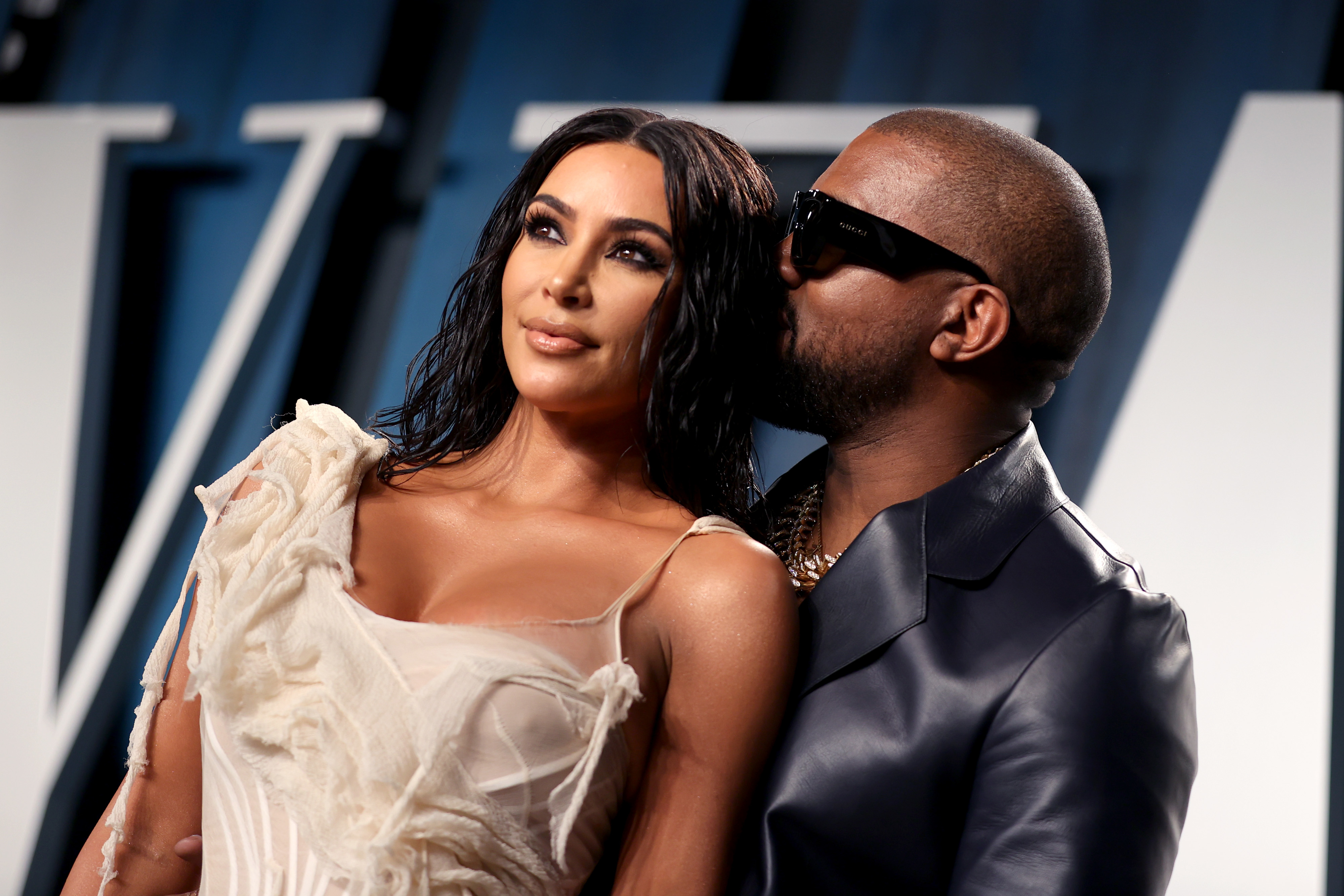 Kim and Ye at a media event