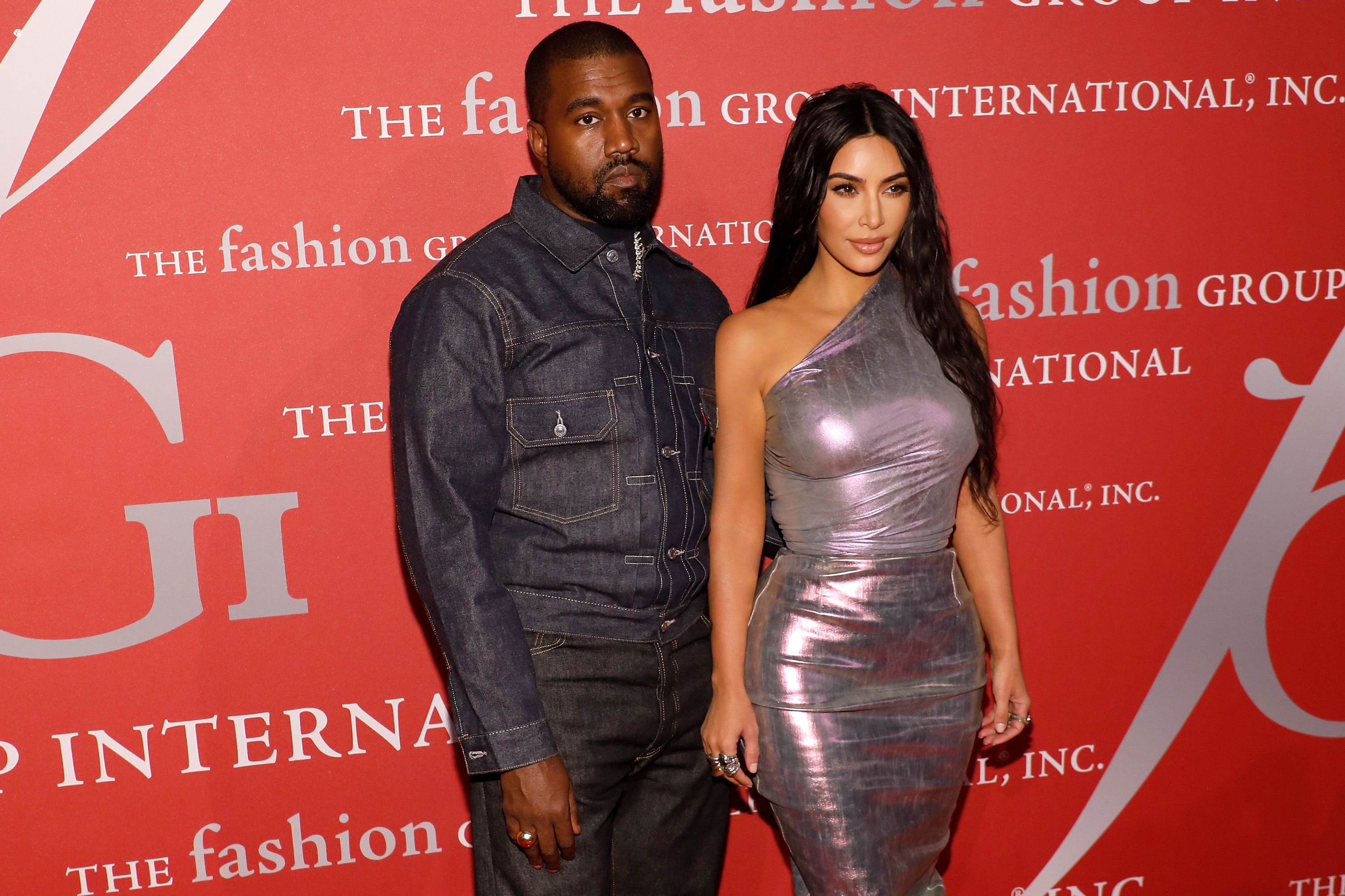 Ye and Kim at a media event