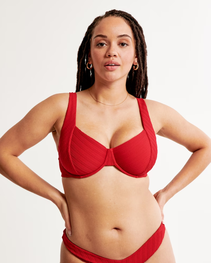 a model wearing the red bikini