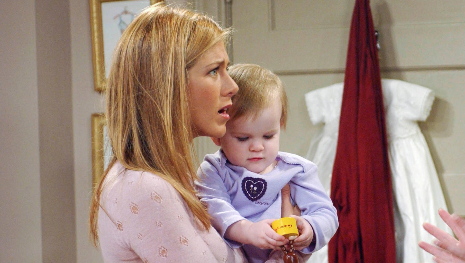 rachel holding a baby in the show
