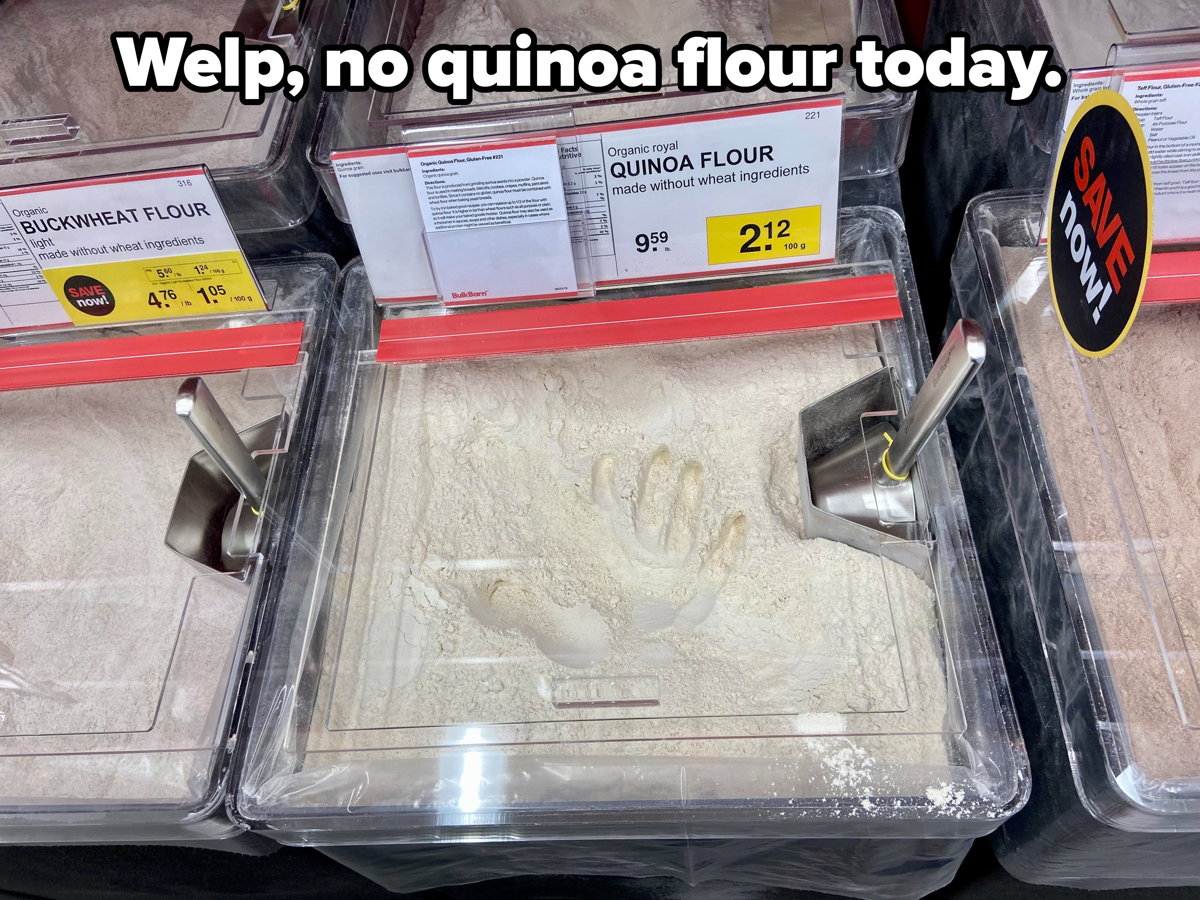 A handprint in a bin of quinoa flour at the store, with the caption &quot;Welp, no quinoa flour today&quot;