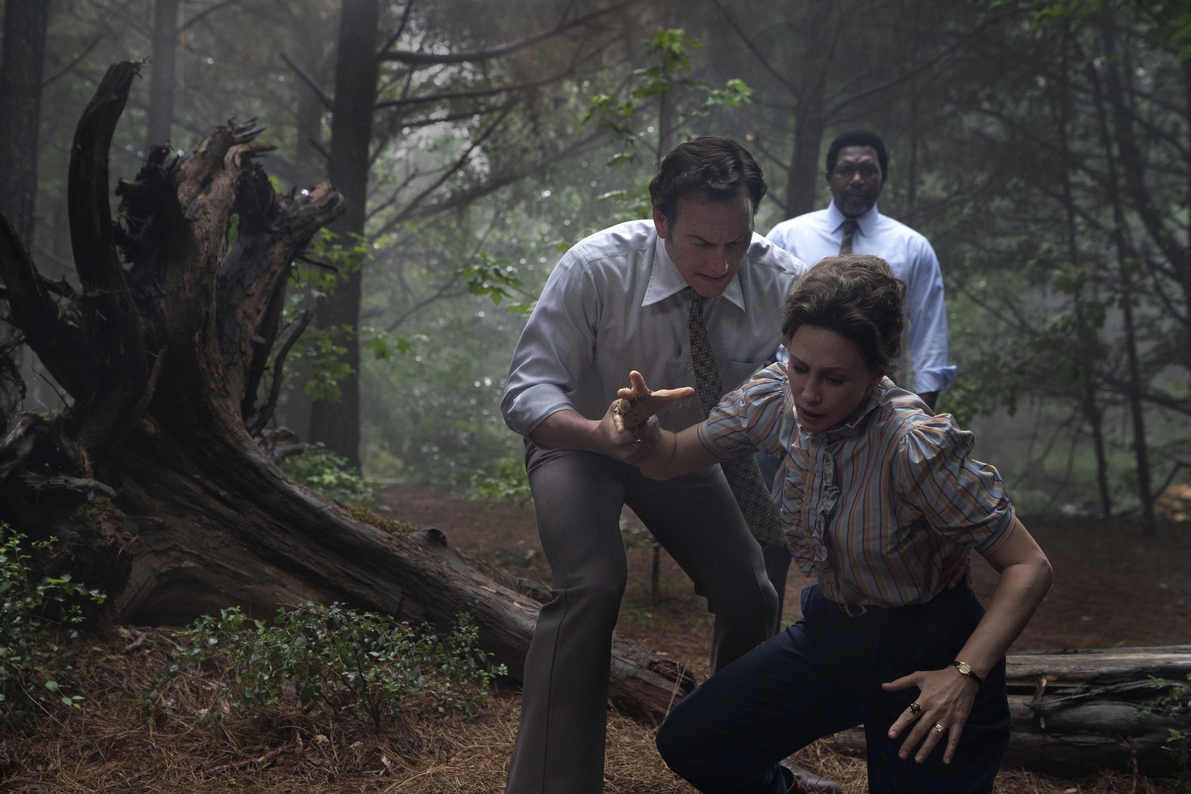 Vera Farmiga, Patrick Wilson and Arthur Keith Bolden stumble around the forest in the third &quot;Conjuring&quot; Movie