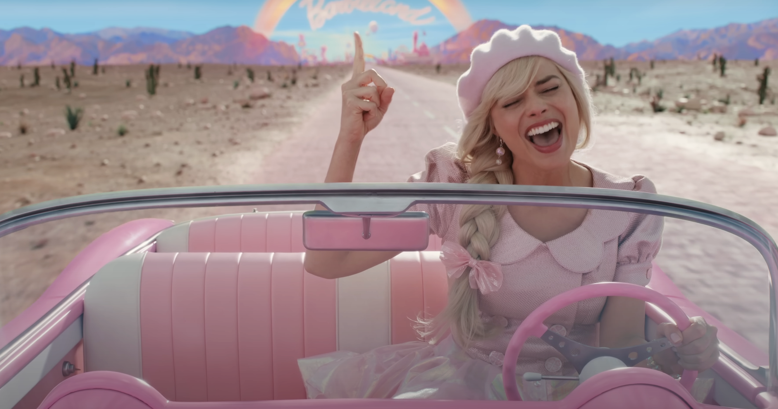 barbie singing in a convertible car