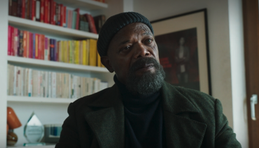 closeup of samuel in character wearing a beanie and coat