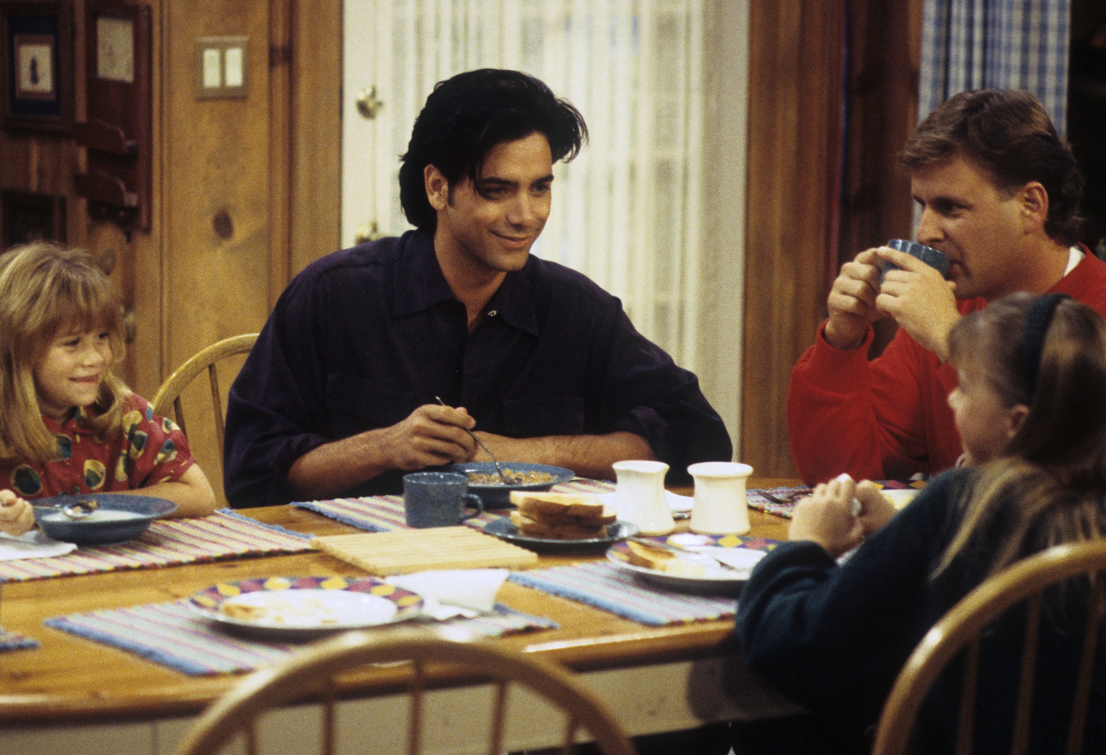 jodie in a scene with the family at the diner table