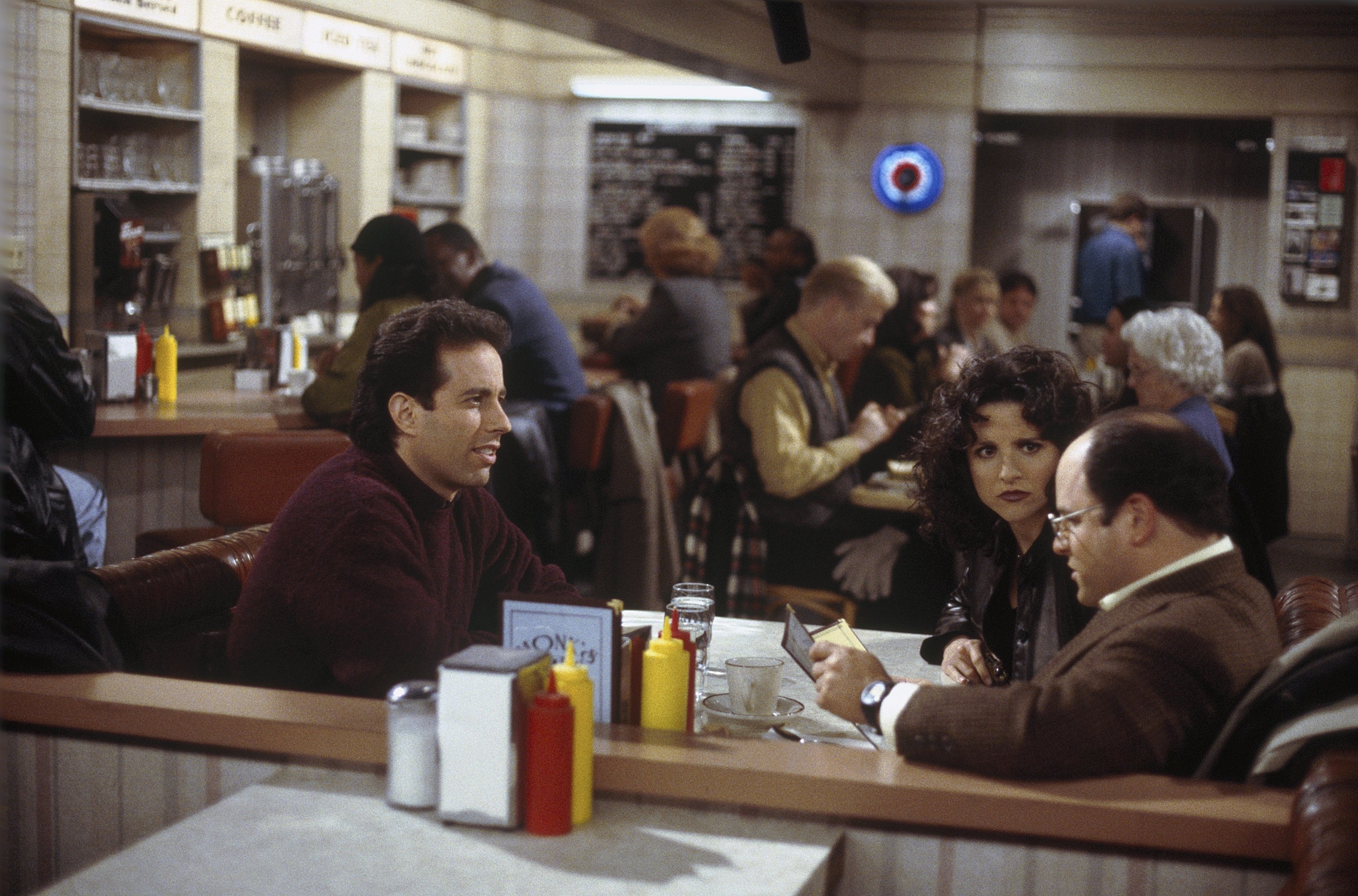 Jerry Seinfeld as Jerry Seinfeld, Julia Louis-Dreyfus as Elaine Benes, Jason Alexander as George Costanza