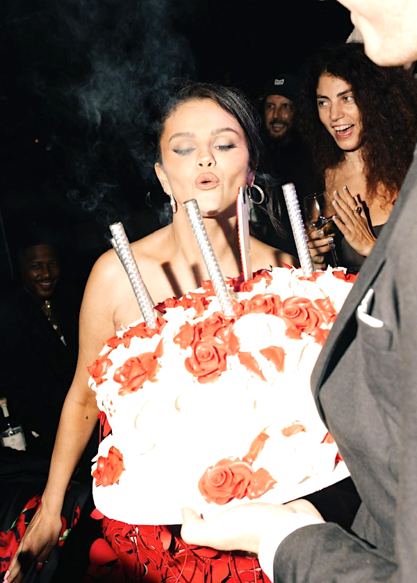 Selena Gomez blowing out her birthday candles