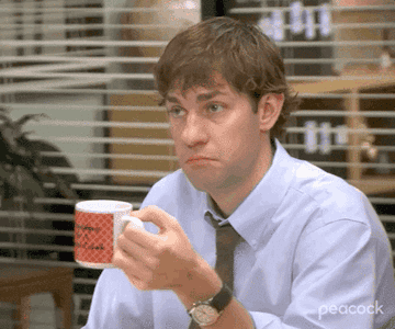 jim making a hmm face on the office