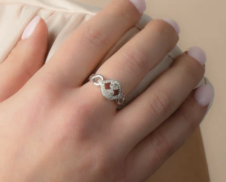 a mode wearing a beautiful ring