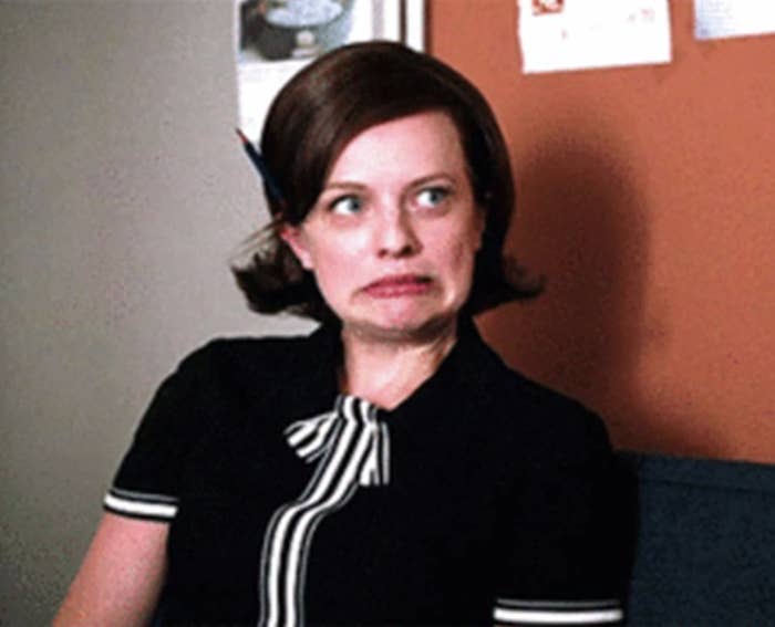 Peggy from Mad Men grimacing