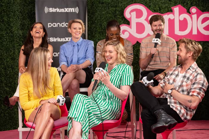 The cast of Barbie sitting down for an interview