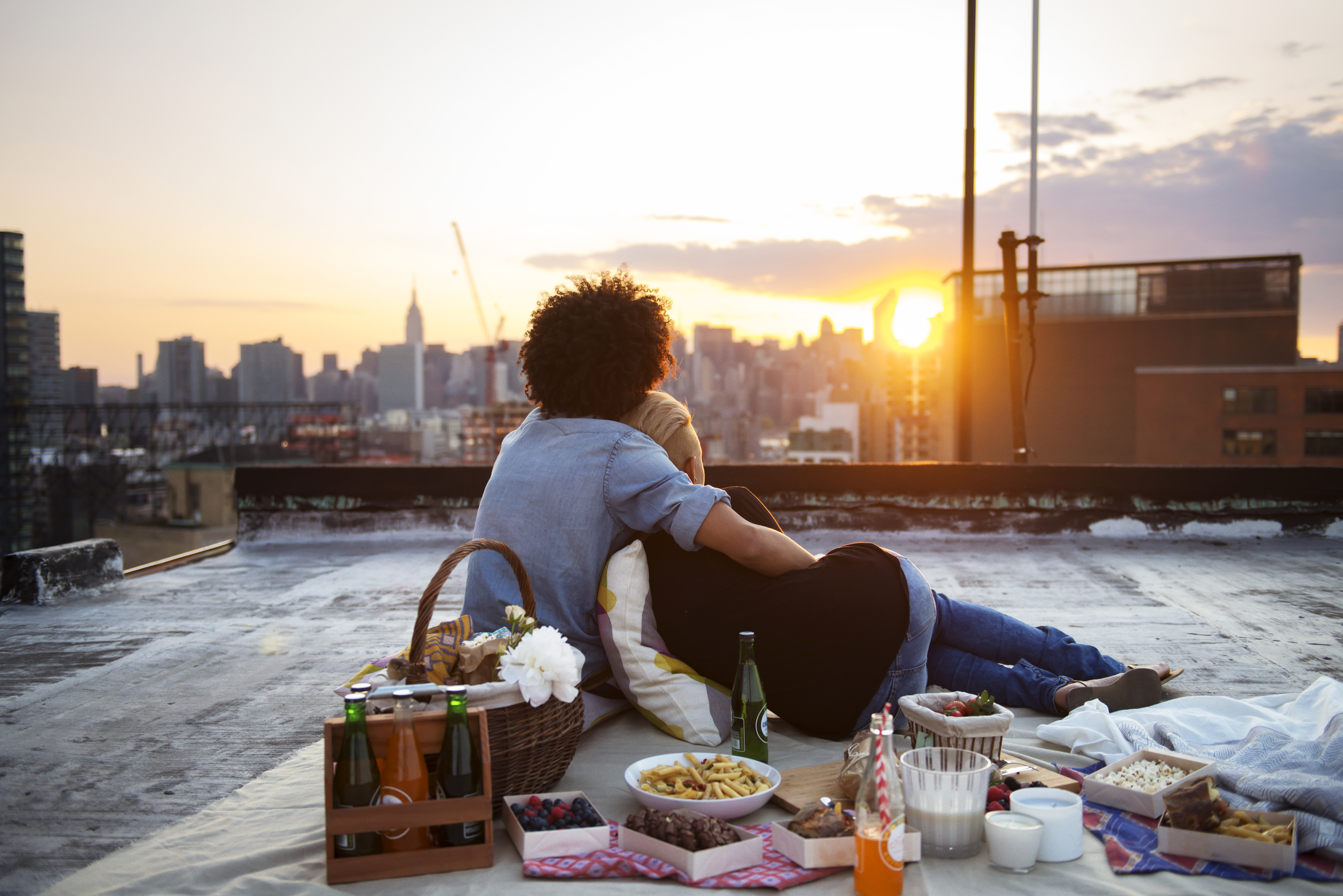 couple having a picnic on a rooftop in brooklyn