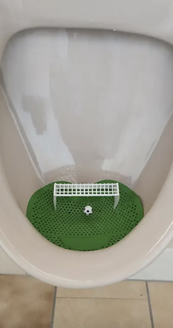 A soccer game in a urinal