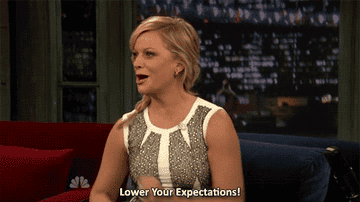A woman sarcastically saying &quot;Lower your expectations!&quot;