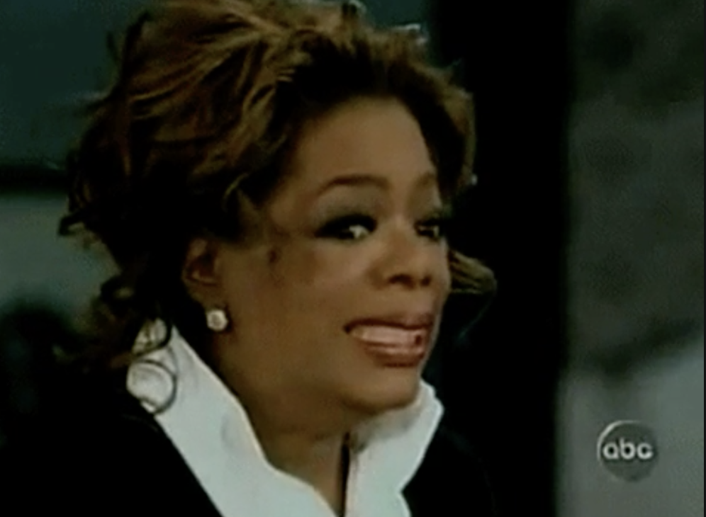 Oprah making a cringe face